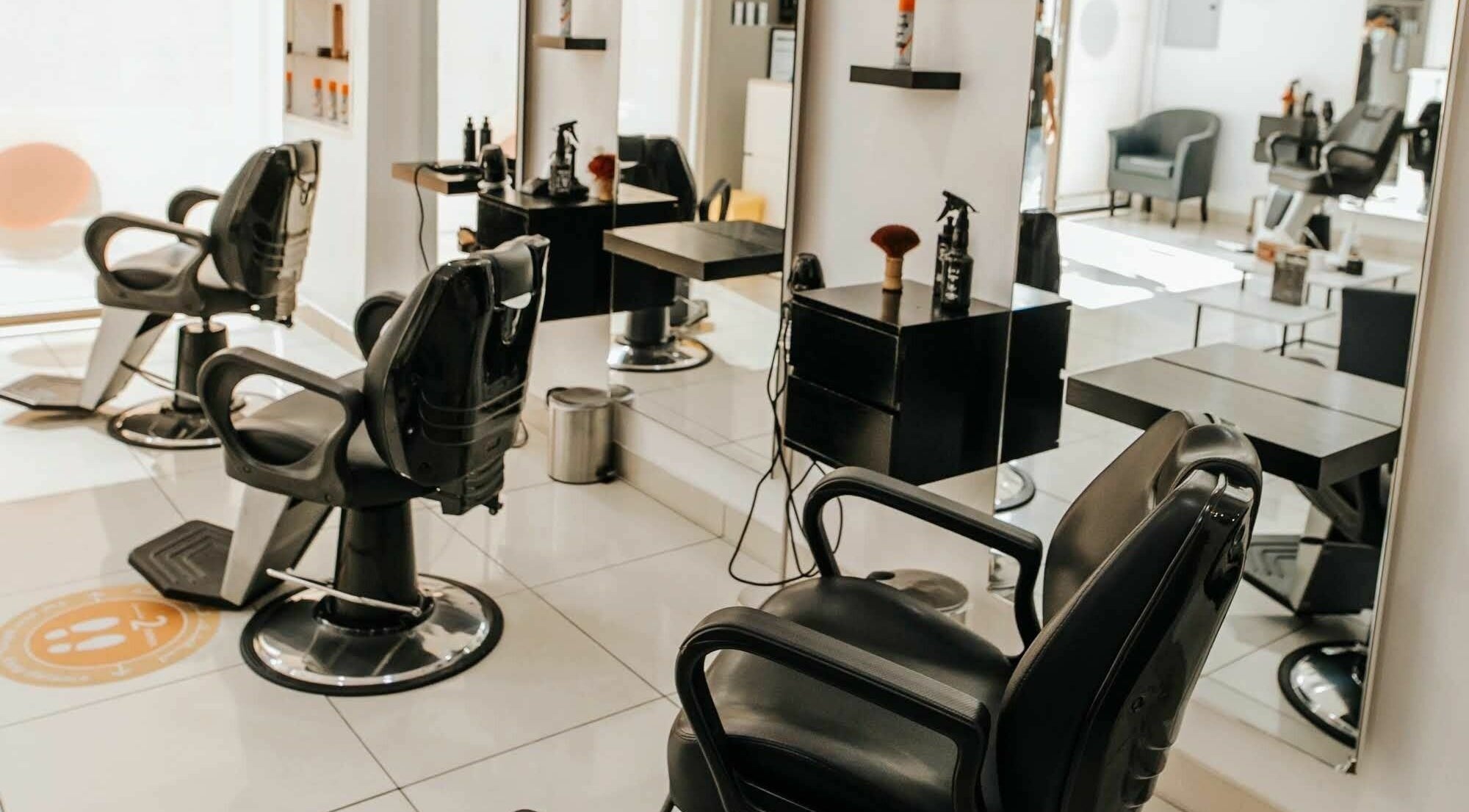 Modern styling chairs at Uppercut Gents Salon, Jumeirah Beach Residences, Dubai, UAE, AE.