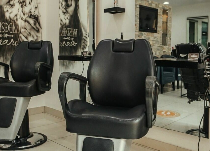 Modern barber chairs at Uppercut Gents Salon, Jumeirah Beach Residences, Dubai, UAE, AE.