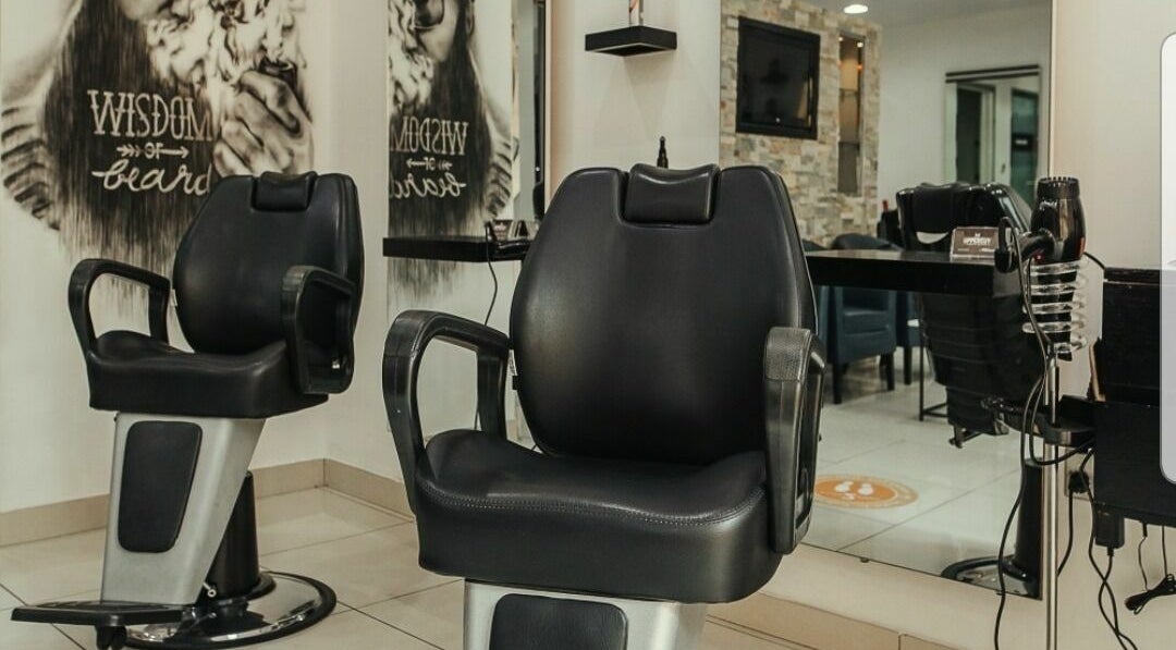 Modern barber chairs at Uppercut Gents Salon, Jumeirah Beach Residences, Dubai, UAE, AE.