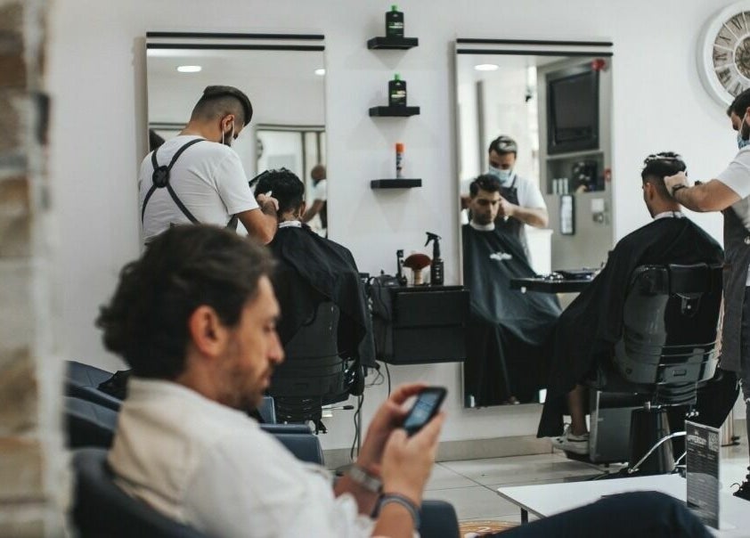 Stylists at Uppercut Gents Salon, Jumeirah Beach Residences, Dubai offering professional grooming services.