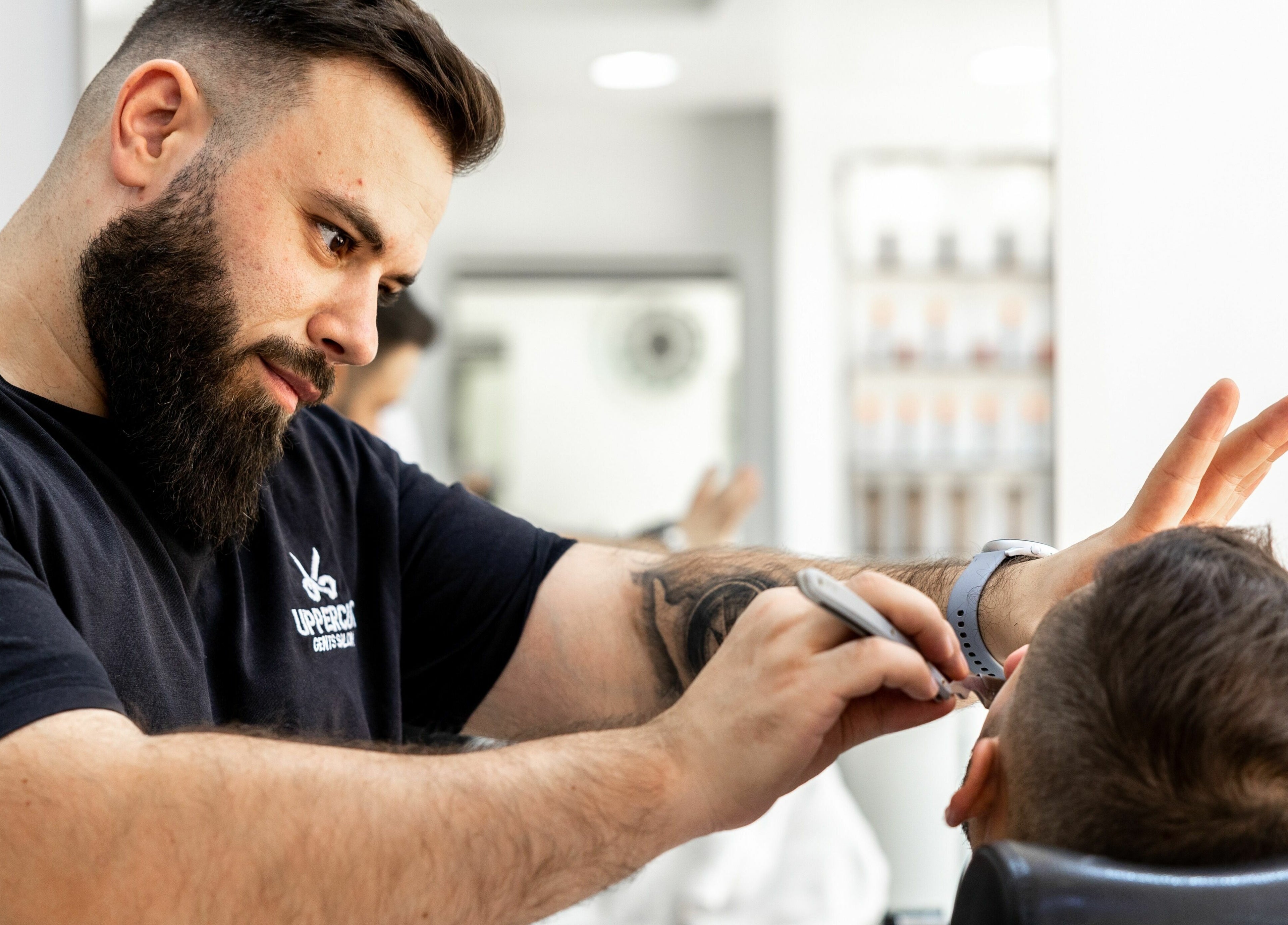 Barber styling at Uppercut Gents Salon, Jumeirah Beach Residences, Dubai, UAE, AE. Precision haircut service.