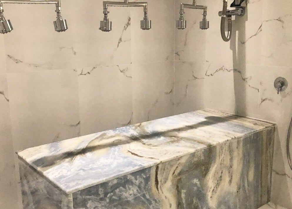 Luxurious marble shower room at Oh My Spa, Argostoli, GR, perfect for rejuvenation and relaxation.