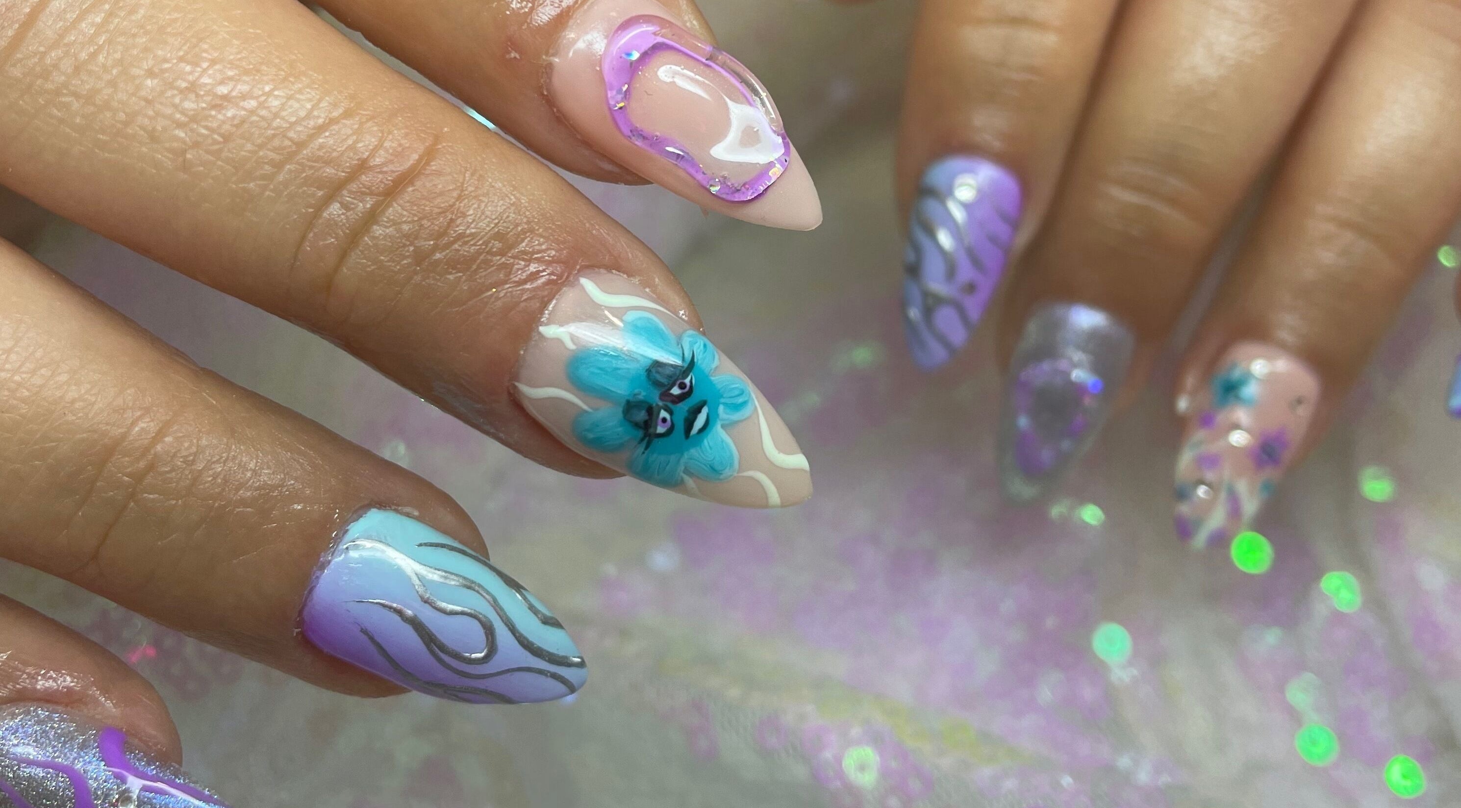 Colorful artistic nails at Kiri's Klaws, Hatfield, England, GB offering unique design nail art.