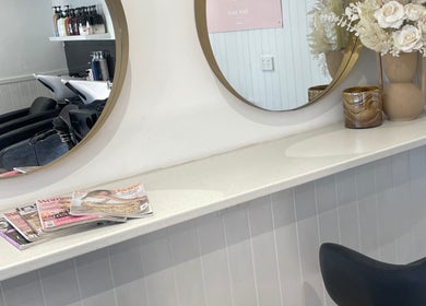 Modern beauty station at Tina Choumar hairdresser in Fulham, South Australia, AU, with elegant decor.