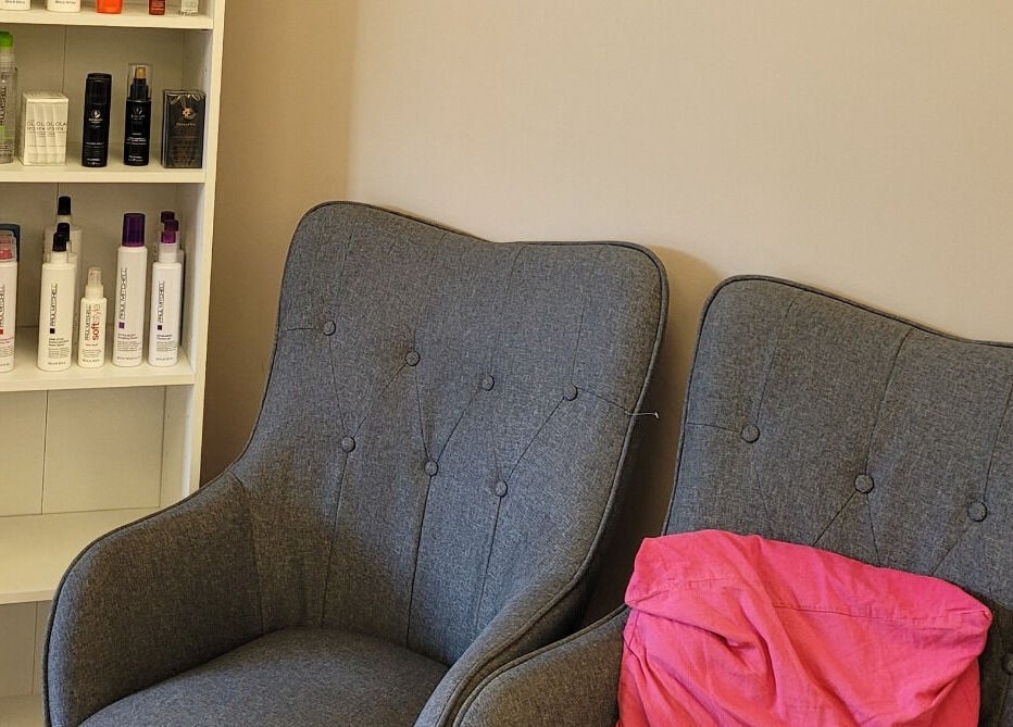 Comfortable seating area at Pamper Box Salon, Harlow, England, GB, perfect for relaxation and waiting.