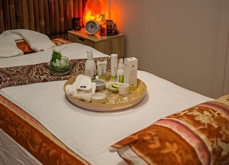 Relaxing massage table setup at Borneo Bali Day Spa, Carlisle, Western Australia, AU featuring soothing decor.