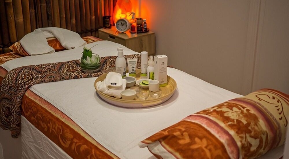 Relaxing massage table setup at Borneo Bali Day Spa, Carlisle, Western Australia, AU featuring soothing decor.