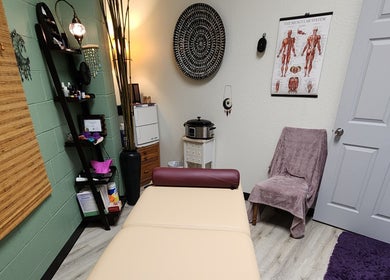 Relaxing massage room at Shanna Massage Therapy in Independence, Missouri, US, with cozy decor.