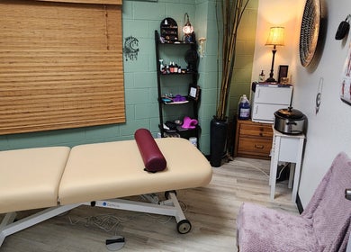 Relaxing massage room at Shanna Massage Therapy, Independence, Missouri, US. Cozy ambiance with treatment table.