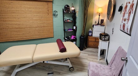 Relaxing massage room at Shanna Massage Therapy, Independence, Missouri, US. Cozy ambiance with treatment table.