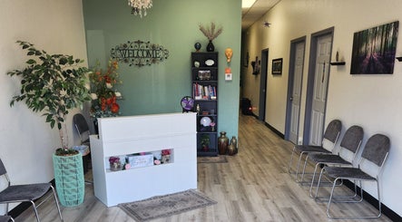 Reception area of Shanna Massage Therapy in Independence, Missouri, US, featuring welcoming decor.