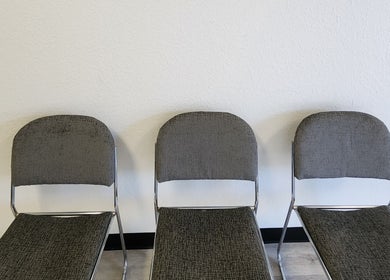 Three gray chairs in Shanna Massage Therapy, Independence, Missouri, US waiting area.
