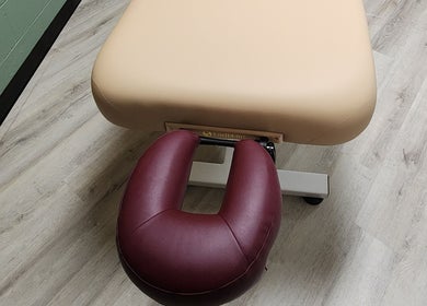 Massage table at Shanna Massage Therapy in Independence, Missouri, US, inviting relaxation and comfort.