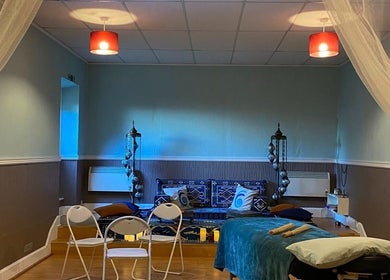 Relaxing therapy room at Zilda Holistic Therapies, Dunfermline, Scotland, GB with cushions and ambient lighting.