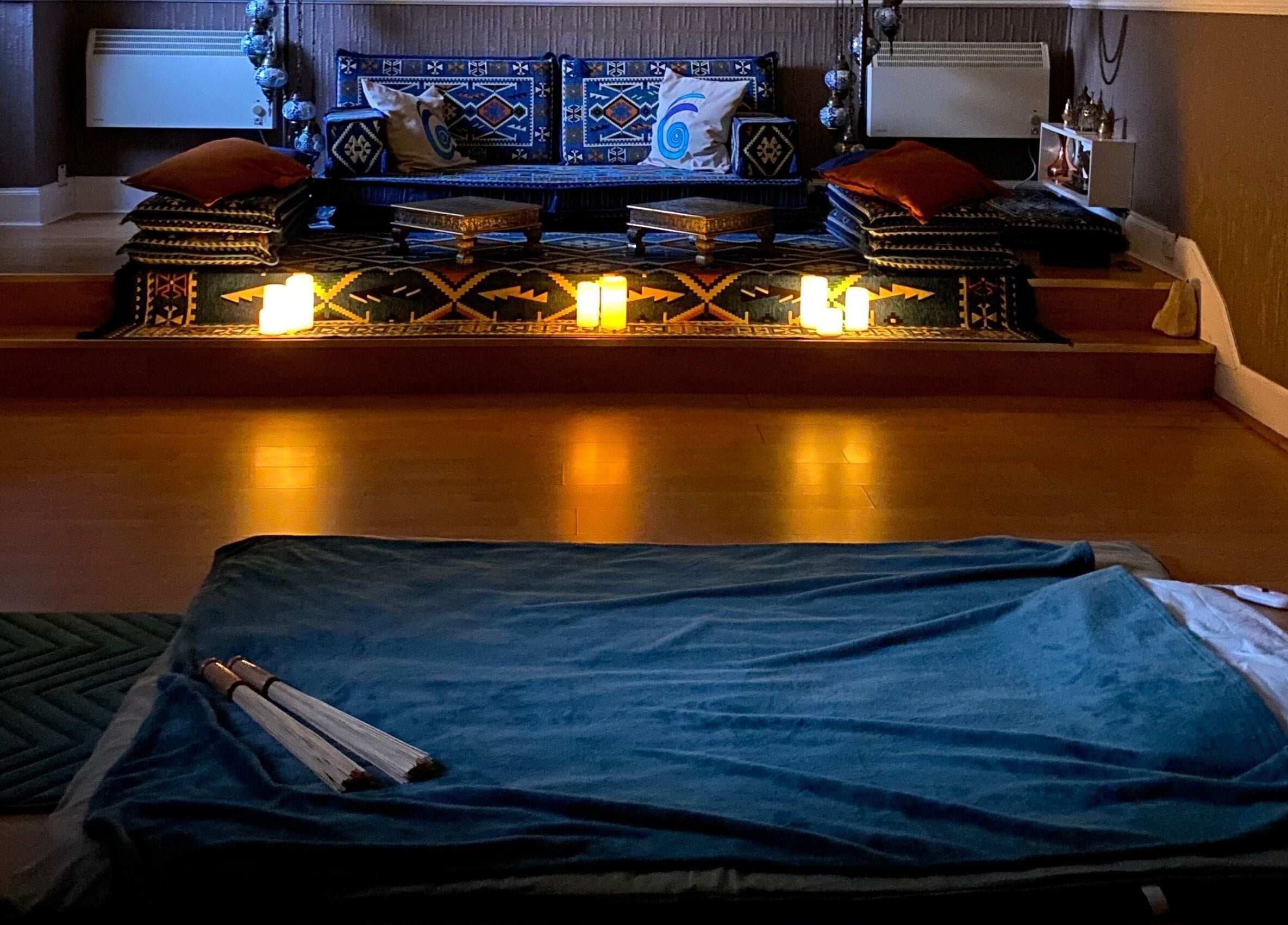 Candlelit treatment room at Zilda Holistic Therapies in Dunfermline, Scotland, GB offering serene relaxation.