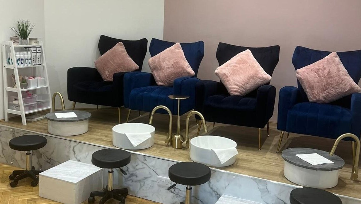 Luxurious pedicure area at The Beauty Room in Spalding, England, GB with plush seats and foot basins.