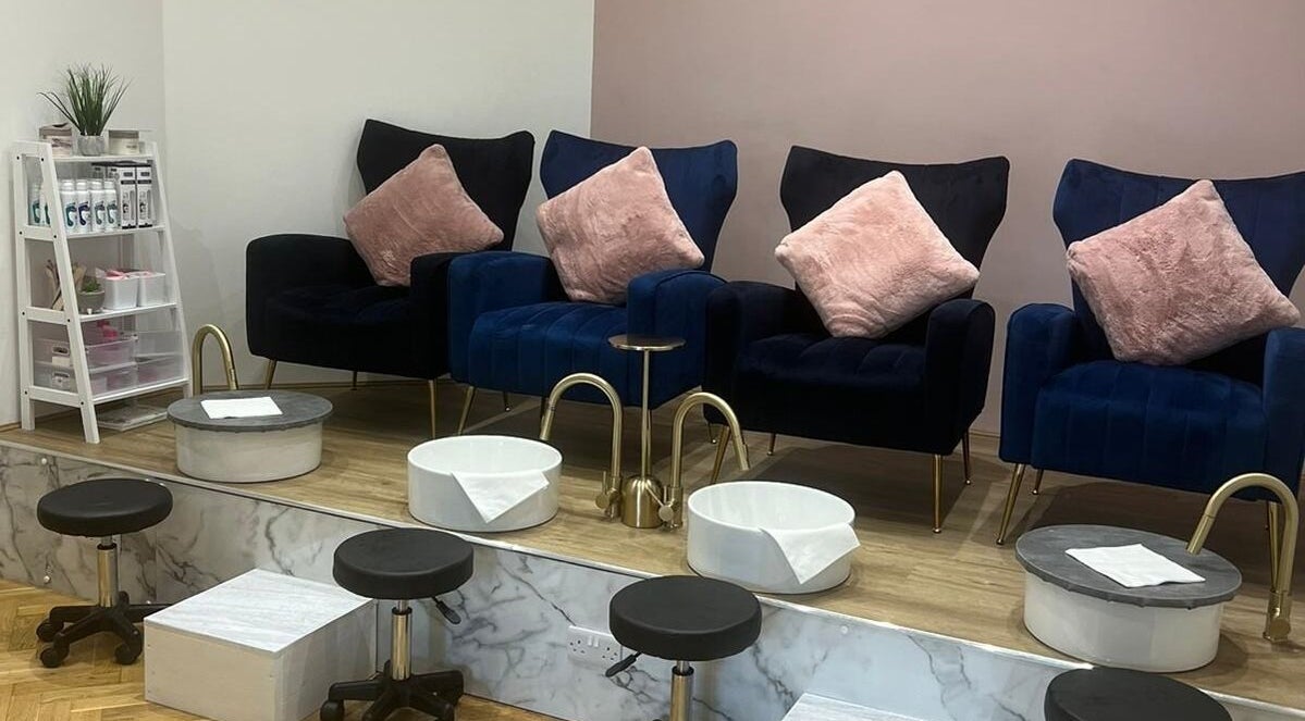 Luxurious pedicure area at The Beauty Room in Spalding, England, GB with plush seats and foot basins.