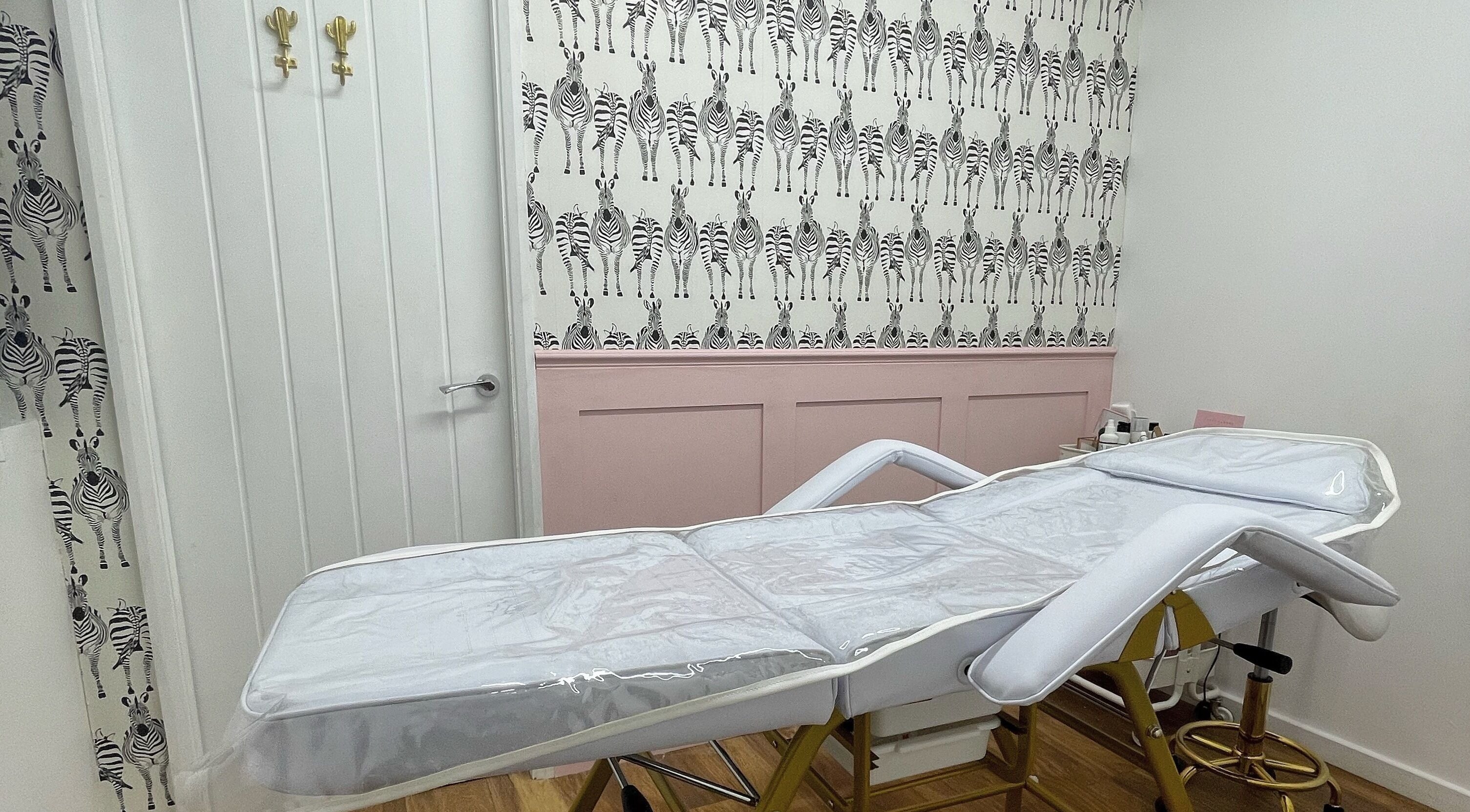 Relaxation room with zebra wallpaper at Yorkshire Beauty Co. & Yorkshire Aesthetics Co., Ripon, England, GB.