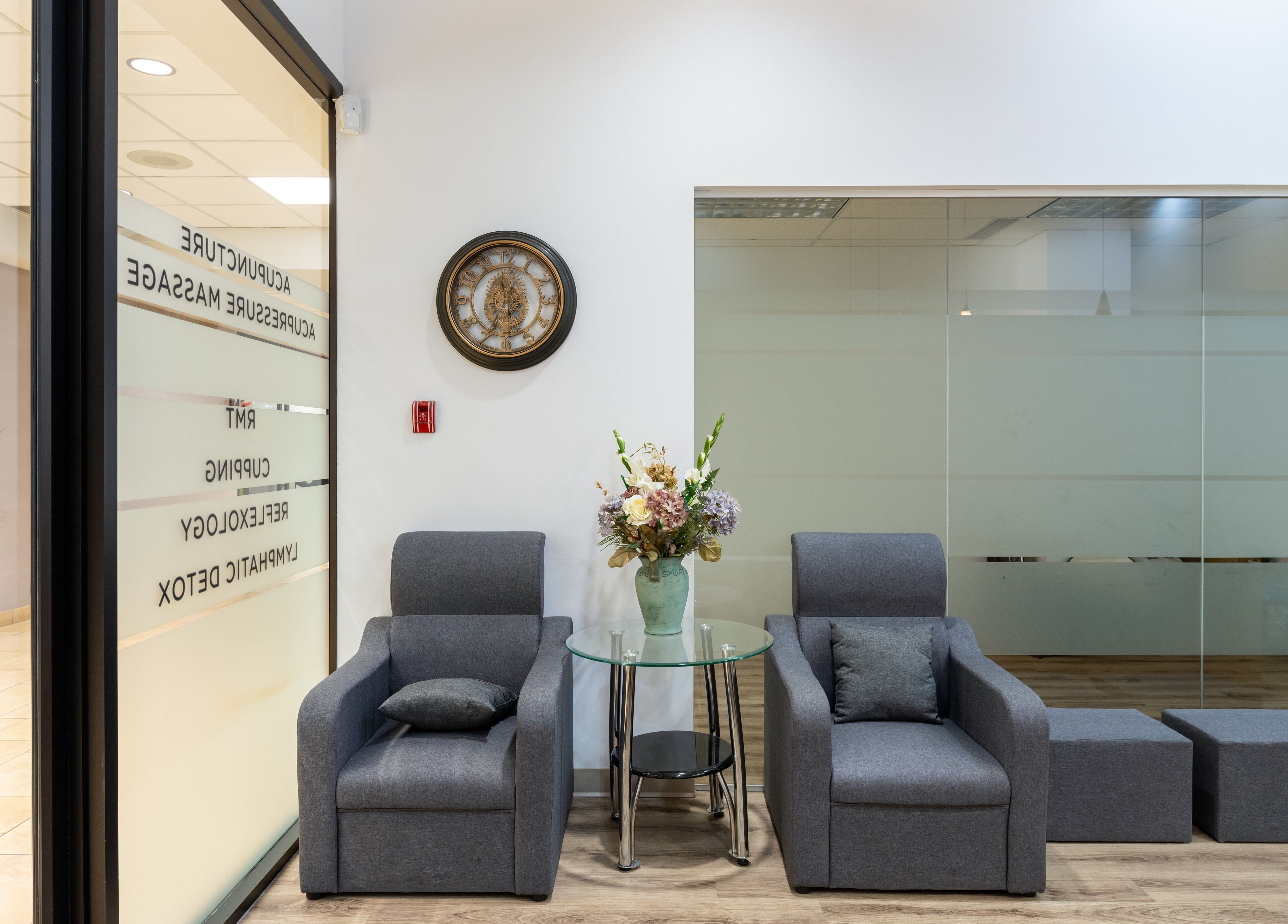 Cozy waiting area at Nano Beauty, New Westminster, British Columbia, CA featuring modern seating and elegant decor.