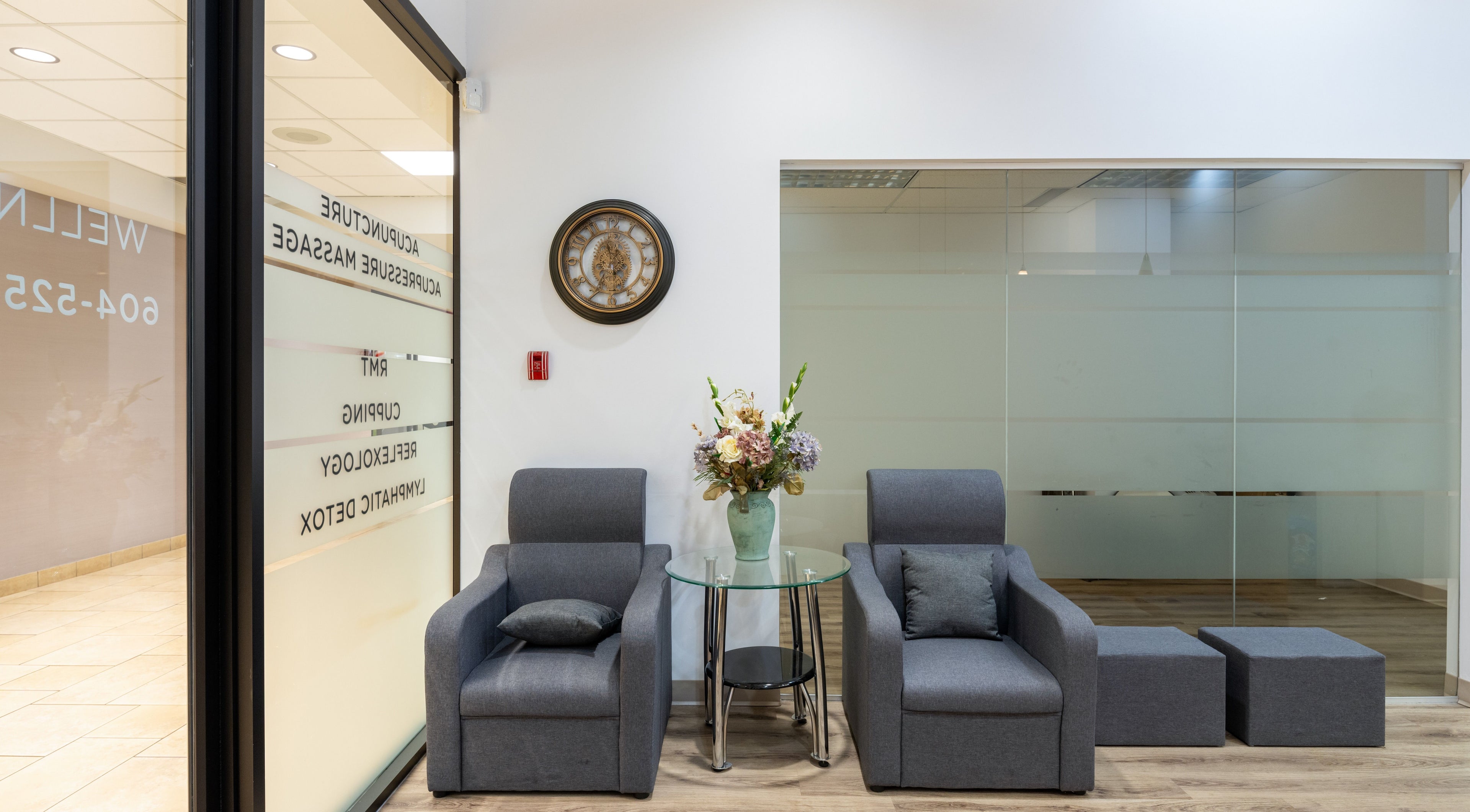 Cozy waiting area at Nano Beauty, New Westminster, British Columbia, CA featuring modern seating and elegant decor.
