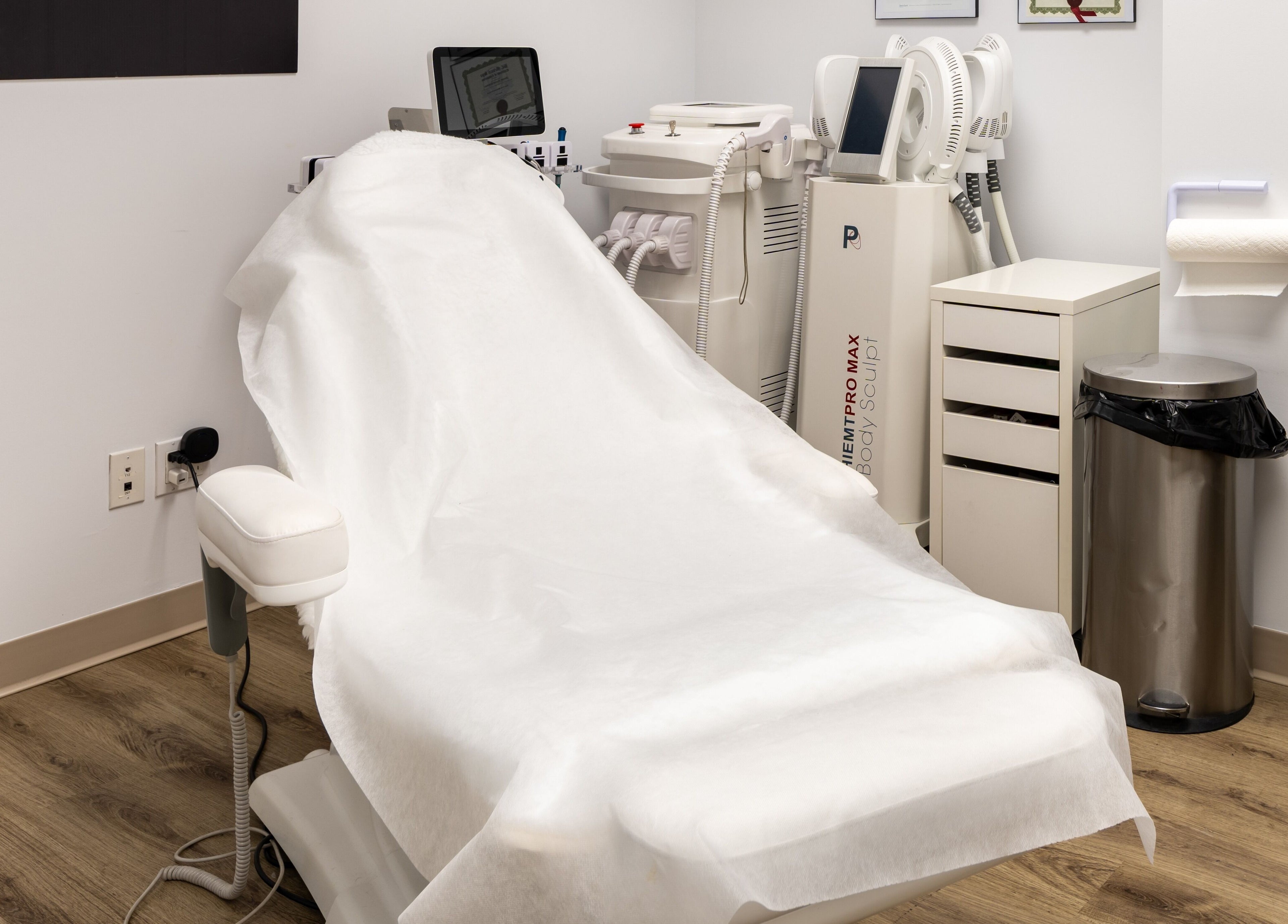 A tranquil treatment room at Nano Beauty in New Westminster, British Columbia, CA, featuring advanced equipment.