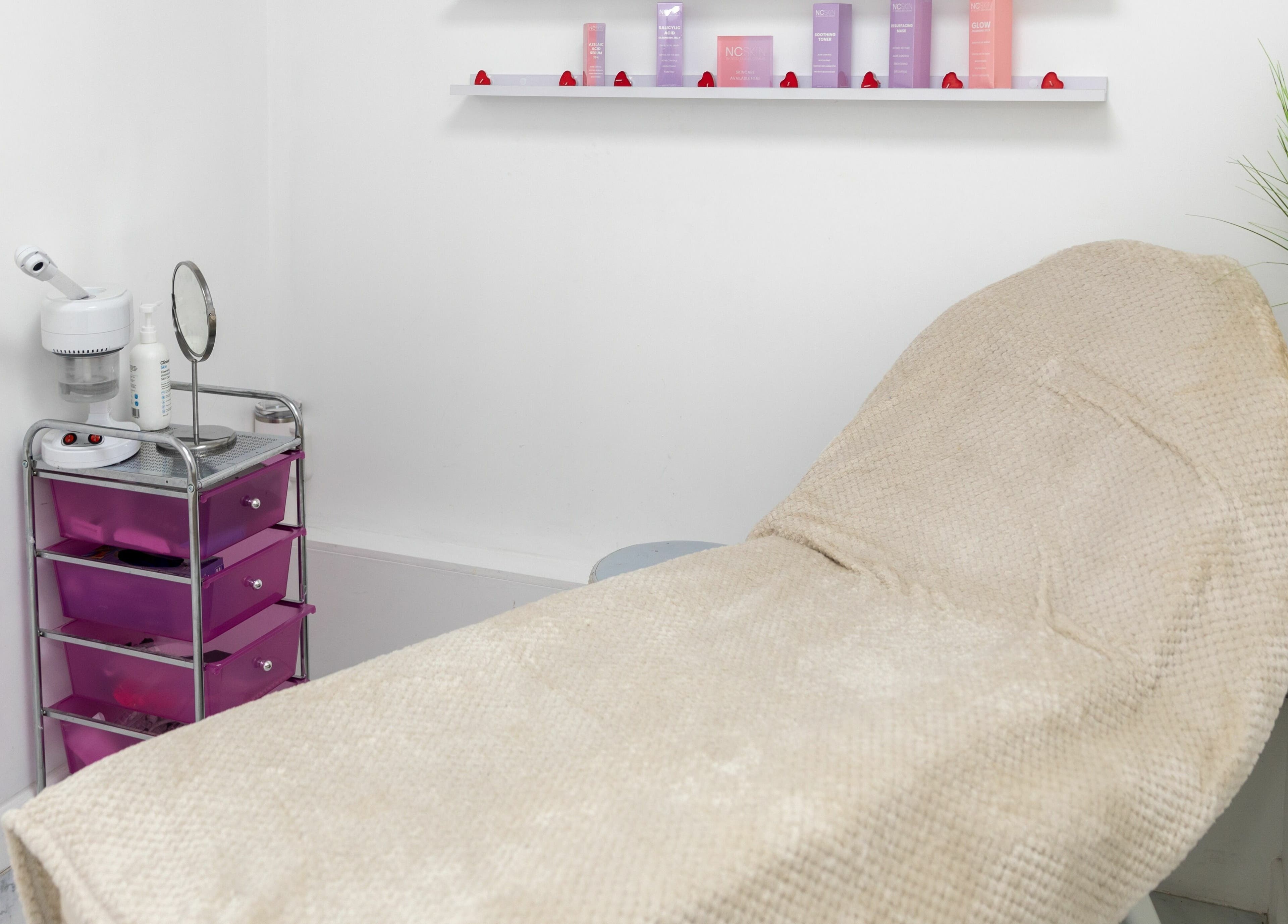 Relaxing treatment room at Gemma Scout Hair Studio - Bexleyheath, England, GB with a comfortable spa bed.
