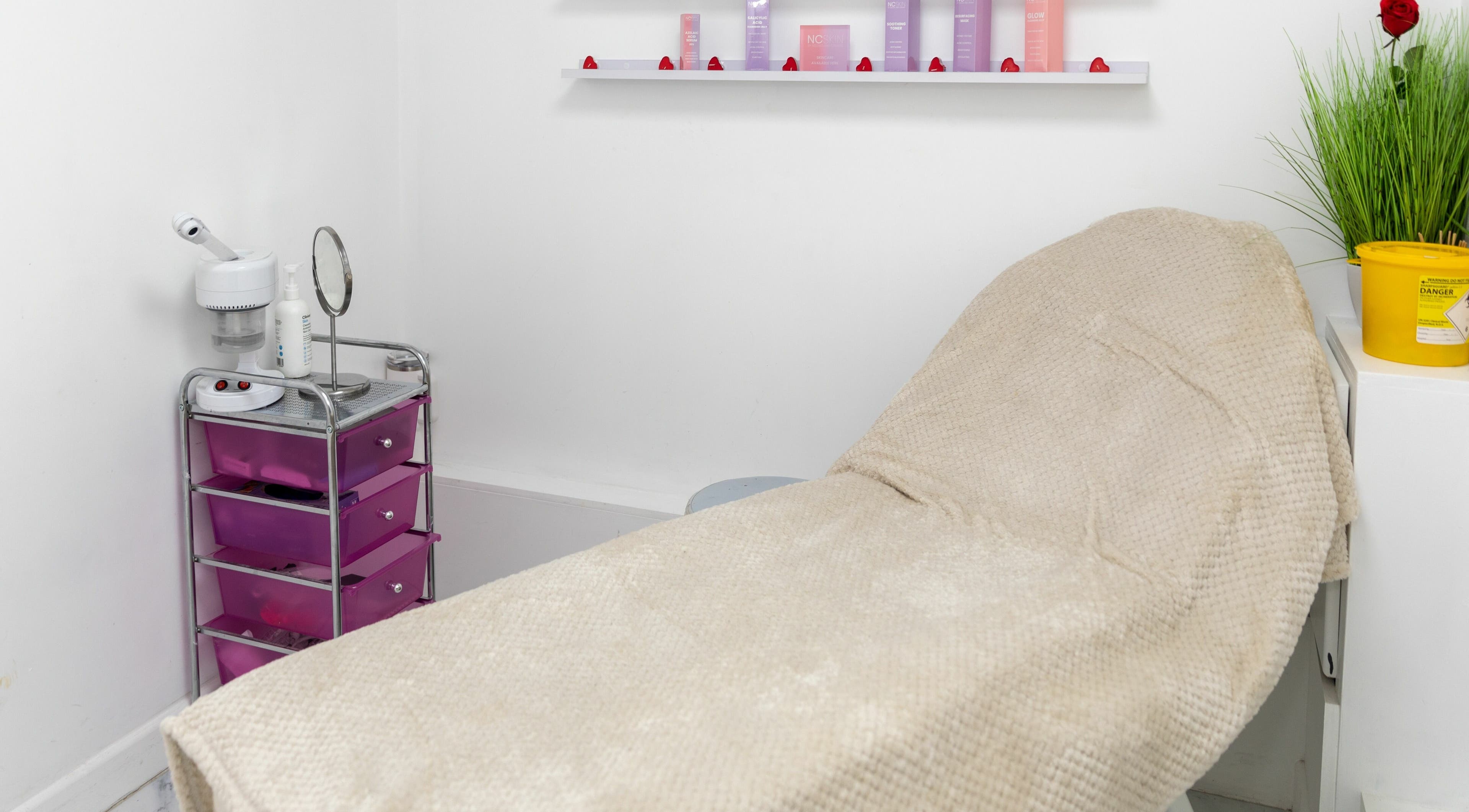 Relaxing treatment room at Gemma Scout Hair Studio - Bexleyheath, England, GB with a comfortable spa bed.