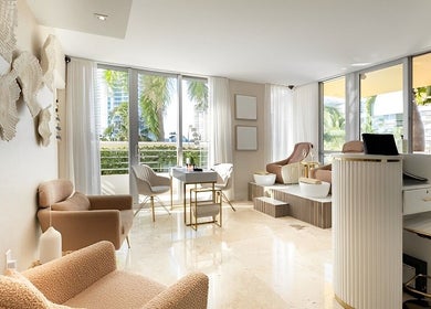 Elegant spa room at SPS101 - Hilton Bentley Miami Beach, featuring plush seating, in Miami Beach, Florida, US.