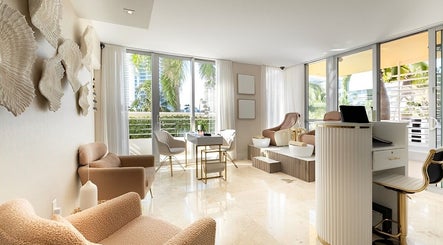 Elegant spa room at SPS101 - Hilton Bentley Miami Beach, featuring plush seating, in Miami Beach, Florida, US.