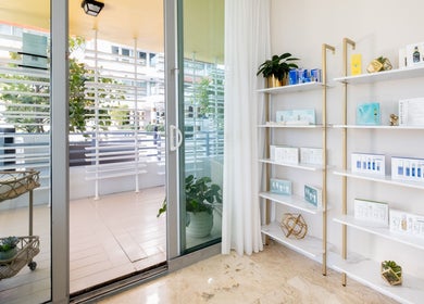 Relaxing wellness nook at SPS101 - Hilton Bentley Miami Beach, Miami Beach, Florida, US with sunlit seating.