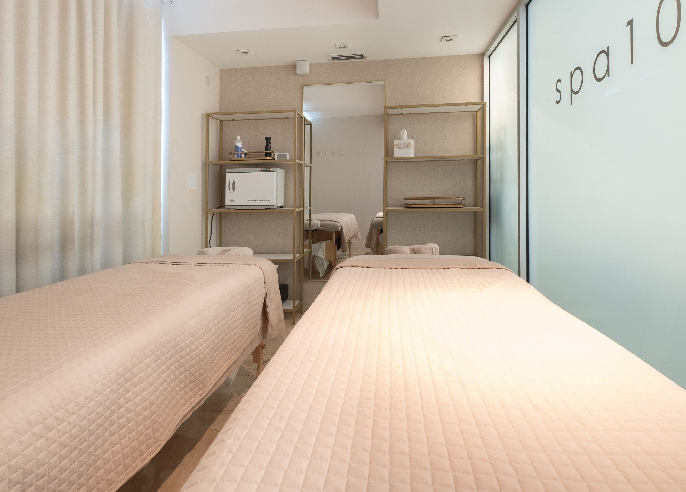 Peaceful spa room at SPS101 - Hilton Bentley Miami Beach, Miami Beach, Florida, US with twin massage tables.
