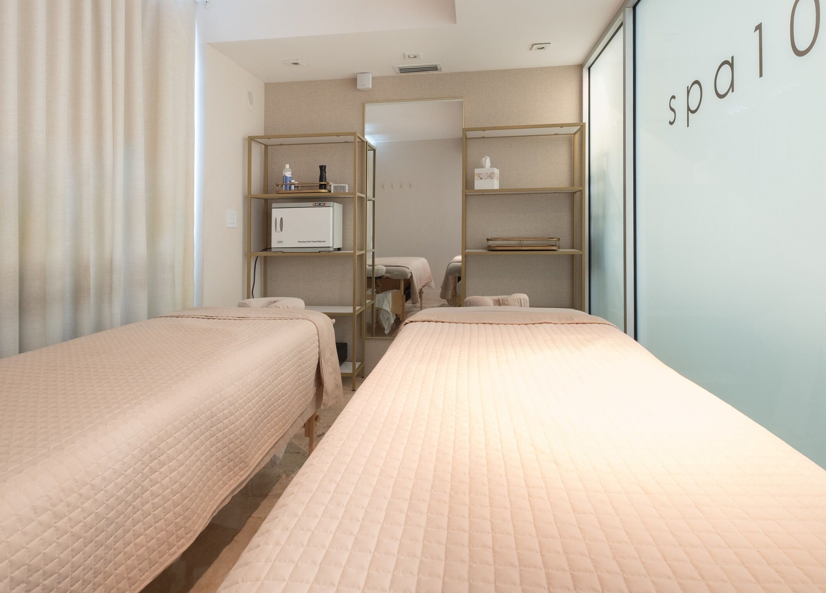 Peaceful spa room at SPS101 - Hilton Bentley Miami Beach, Miami Beach, Florida, US with twin massage tables.