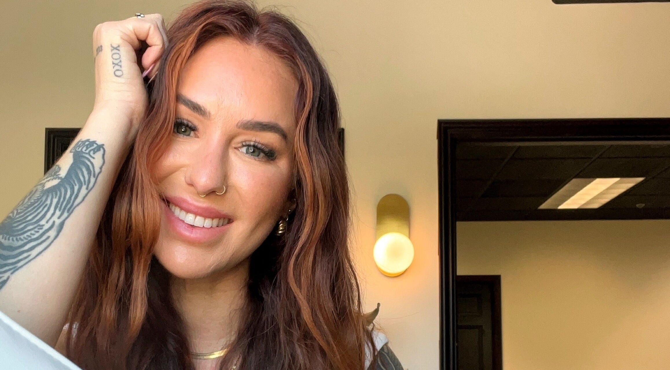 A person smiling warmly inside Britt Babe Cave in Temecula, California, US.