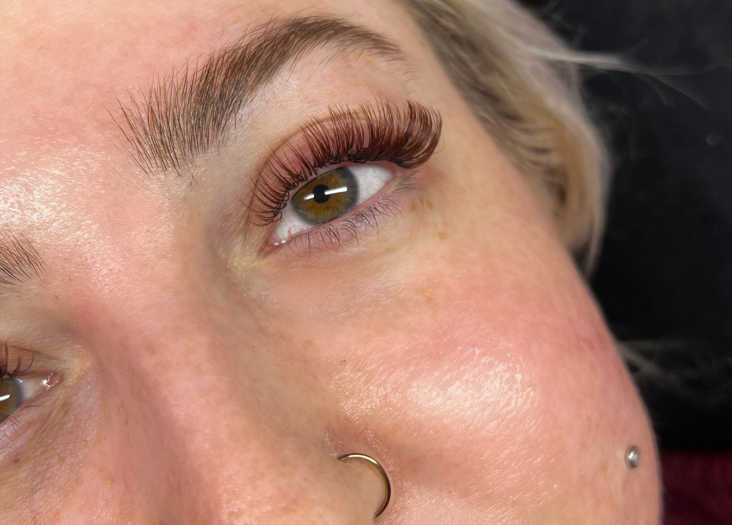 Close-up of enhanced eyelashes at Britt Babe Cave, Temecula, California, US. Perfect lash extensions showcased.