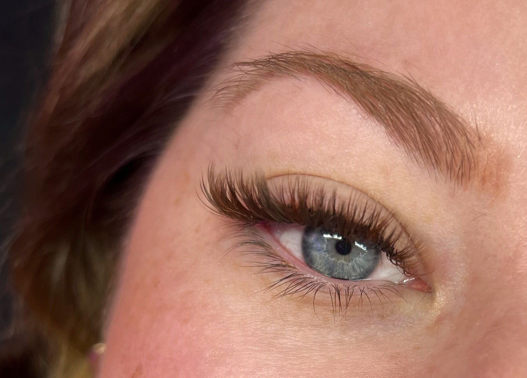 Close-up of expertly styled eyelashes at Britt Babe Cave, Temecula, California, US.