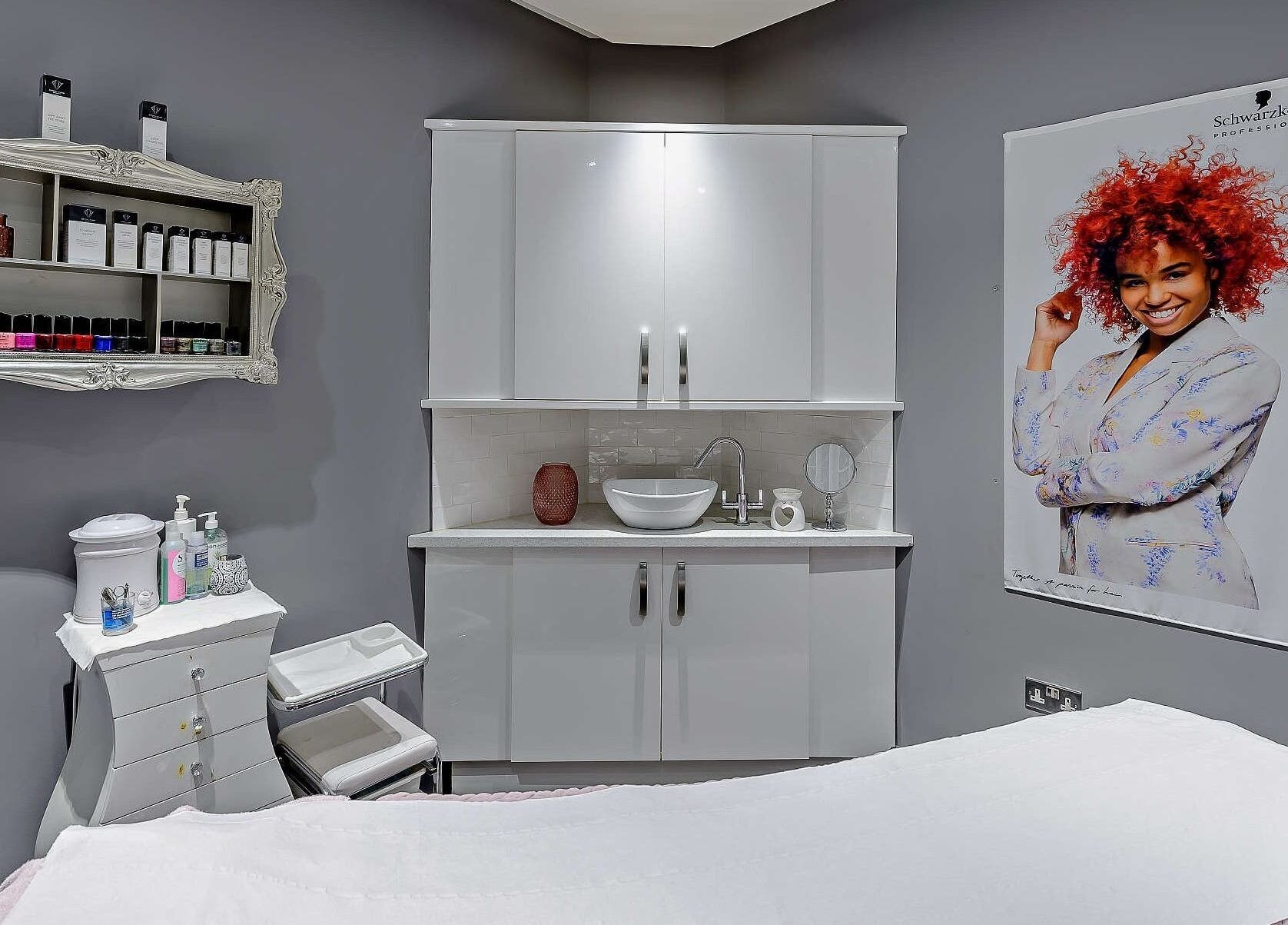 Chewys collective serene treatment room in Gloucester, England, GB with stylish decor and skincare products.