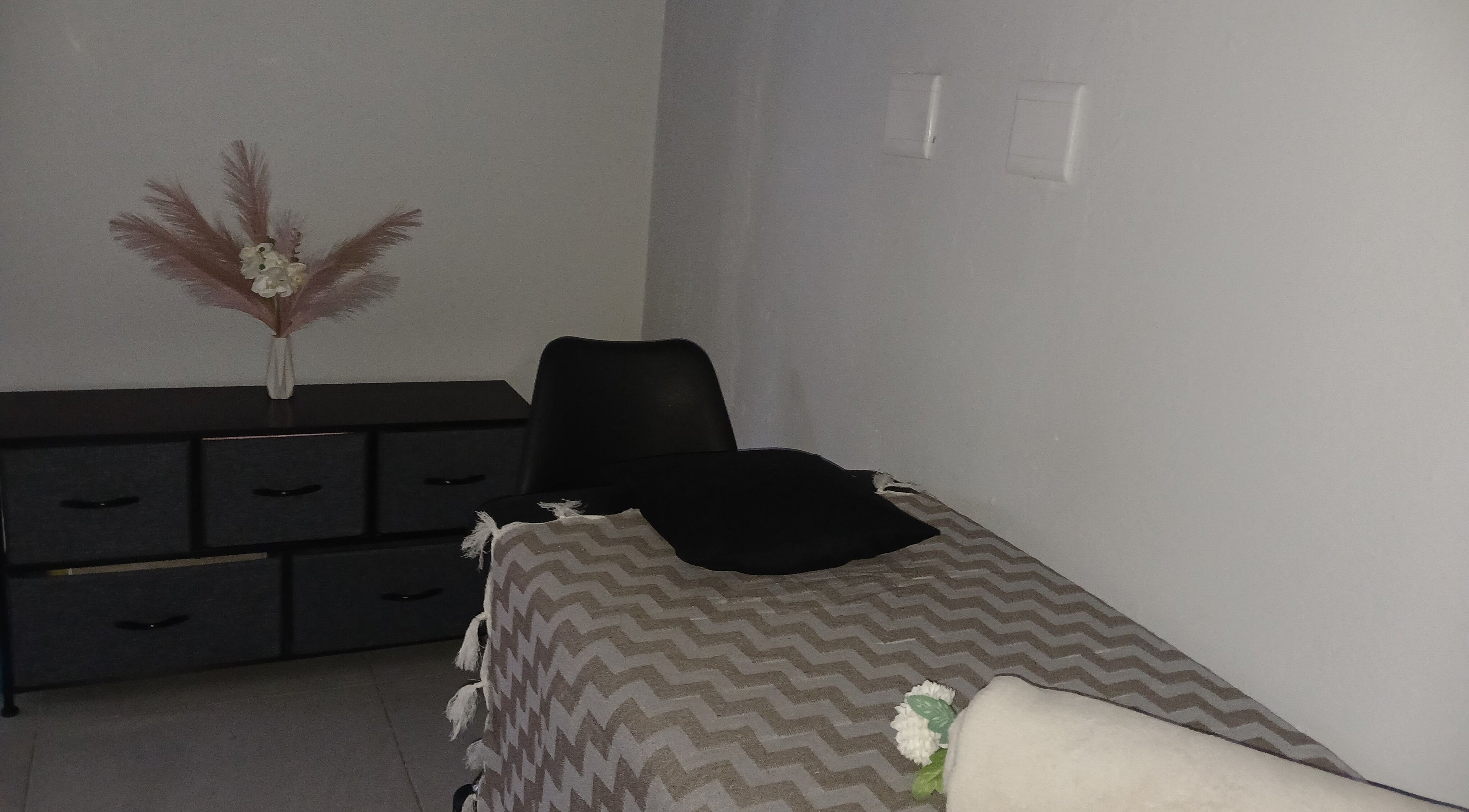 Relaxing massage room at Pampered and Polished by Tk, Midrand, Gauteng, ZA with calming decor.