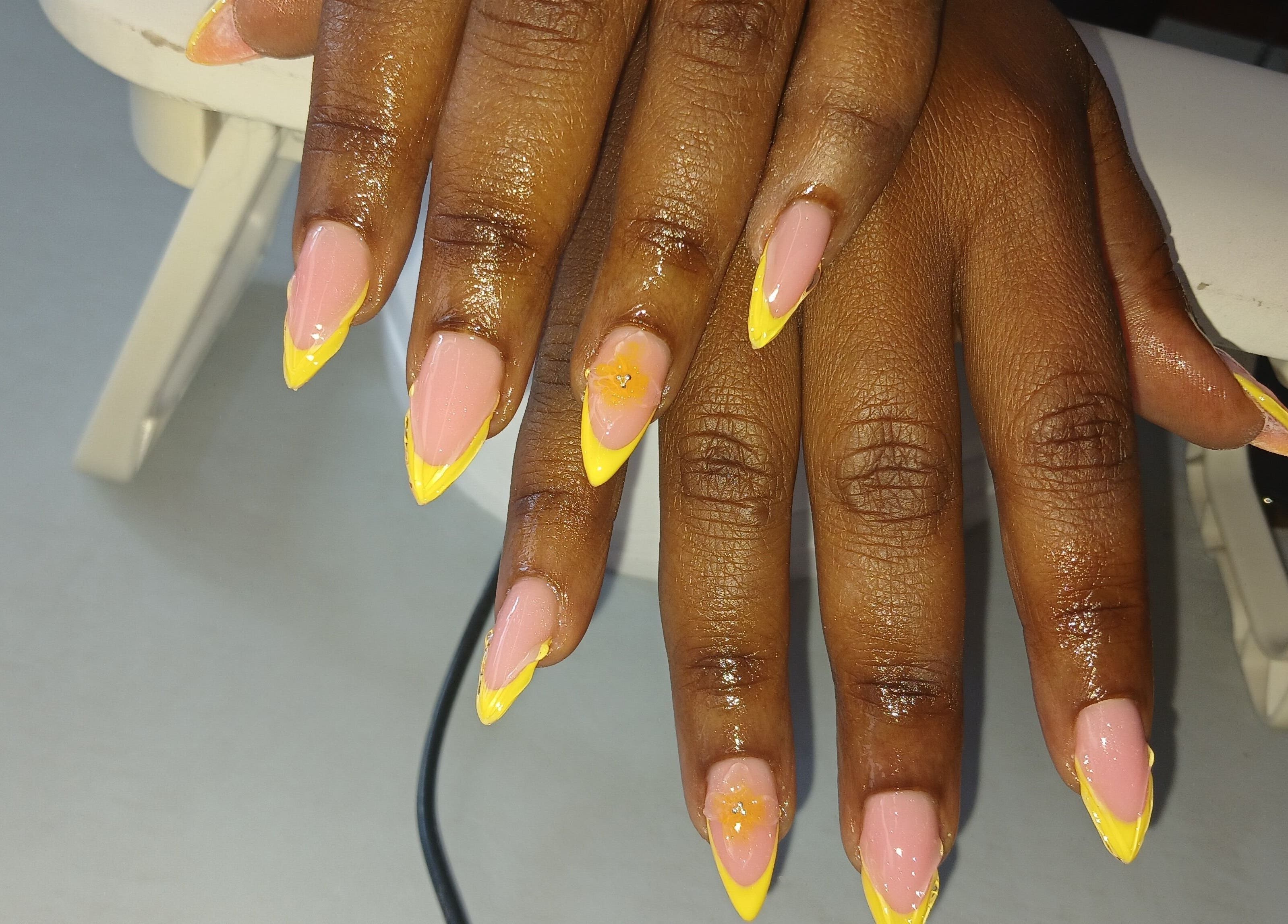 Stylish yellow-tipped nails at Pampered and Polished by Tk, Midrand, Gauteng, ZA.