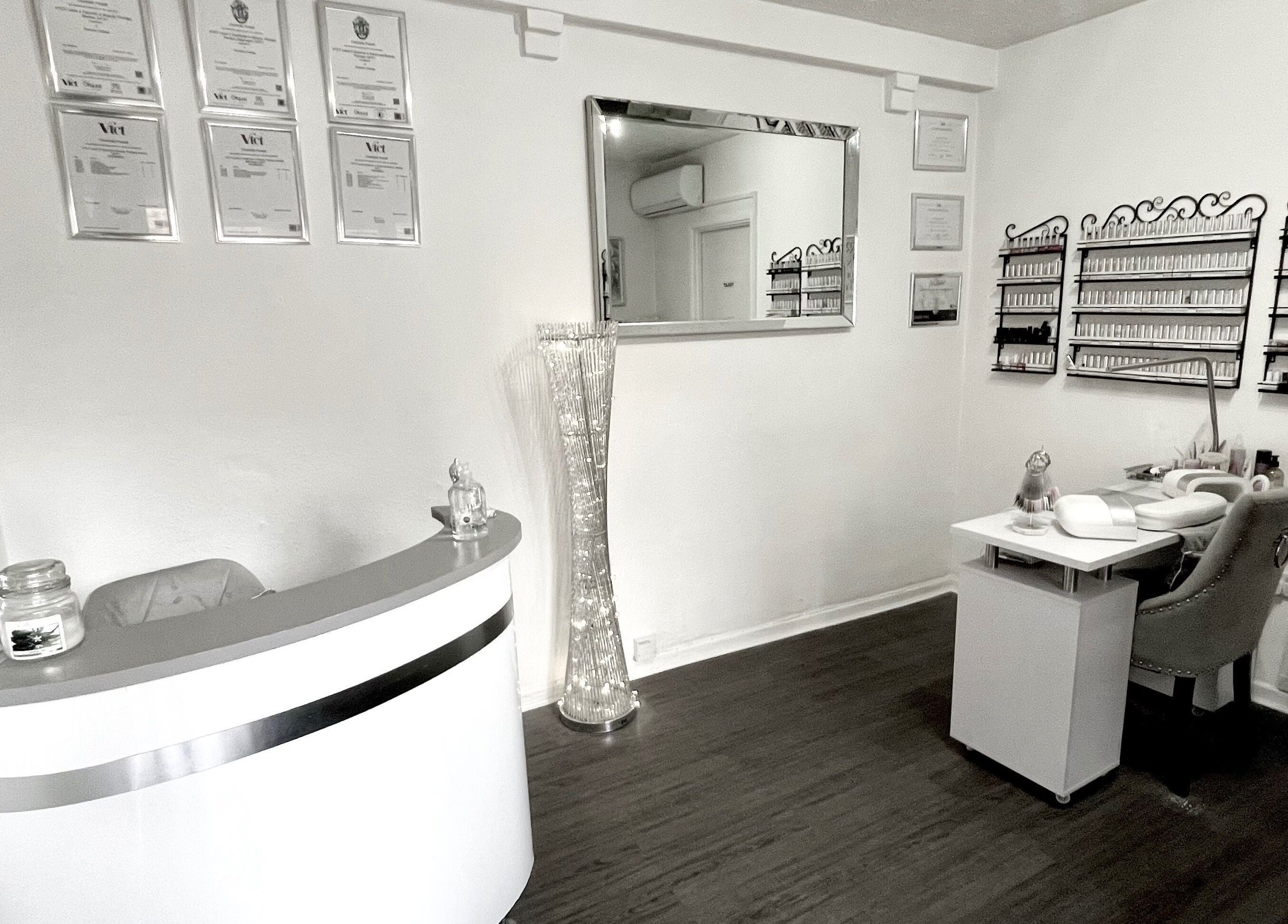 Elegant reception and manicure area at Enhanced Beauty and Well-Being, Swindon, England, GB.