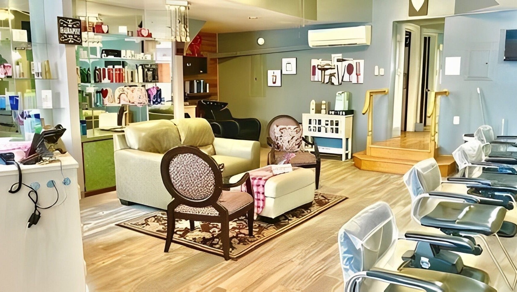 Comfortable seating area with chic chairs at Obsessions Salon, North Tonawanda, New York, US.