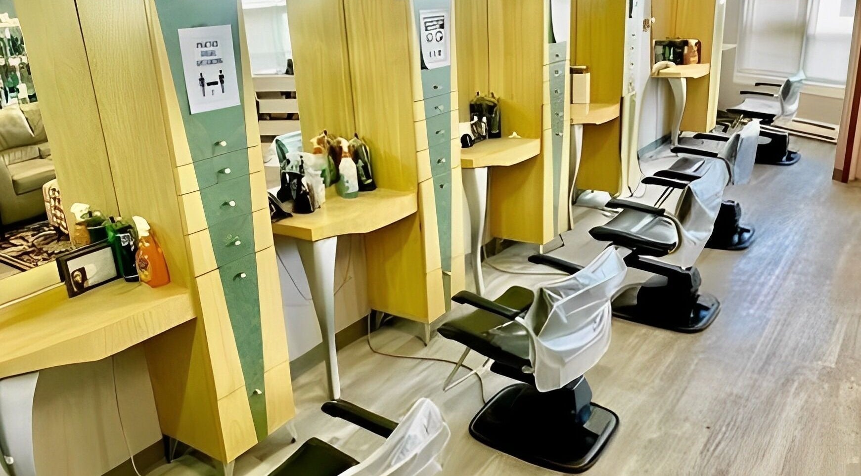 Modern salon chairs and stations at Obsessions Salon in North Tonawanda, New York, US.