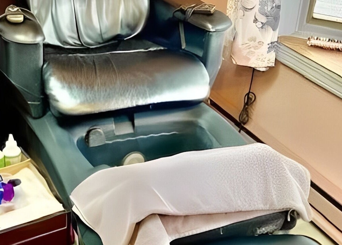 Pedicure chair at Obsessions Salon, North Tonawanda, New York, US, offering a luxurious pampering experience.