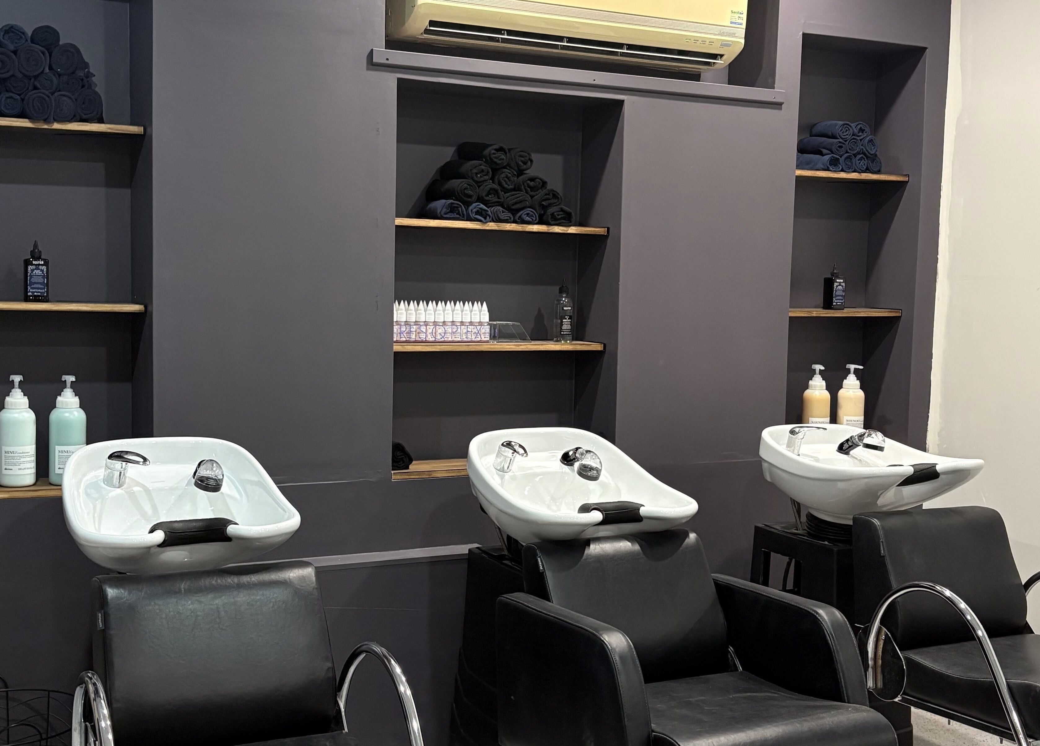 Elegant hair wash stations at The Hair Collective - Arana Hills, Arana Hills, Queensland, AU.