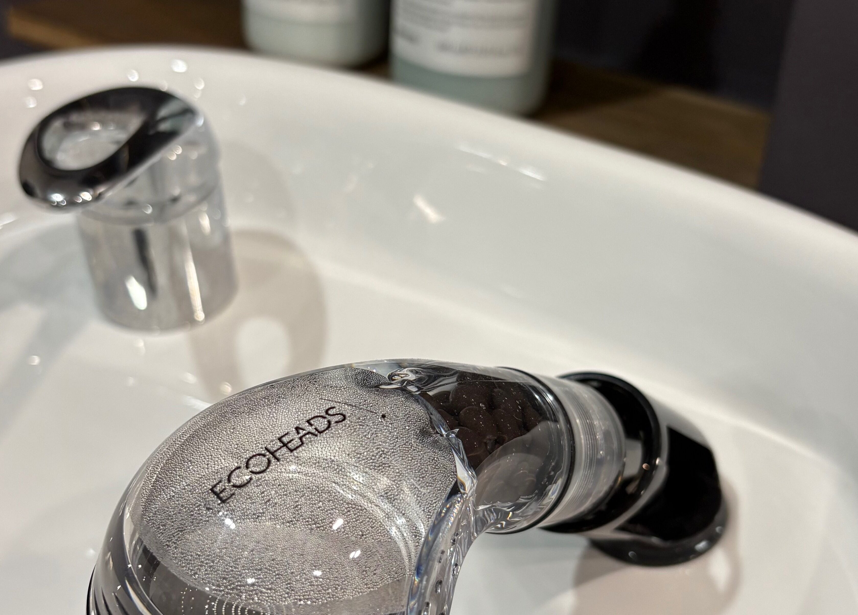 Eco-friendly salon sink at The Hair Collective - Arana Hills, Queensland, AU, enhancing client experience.