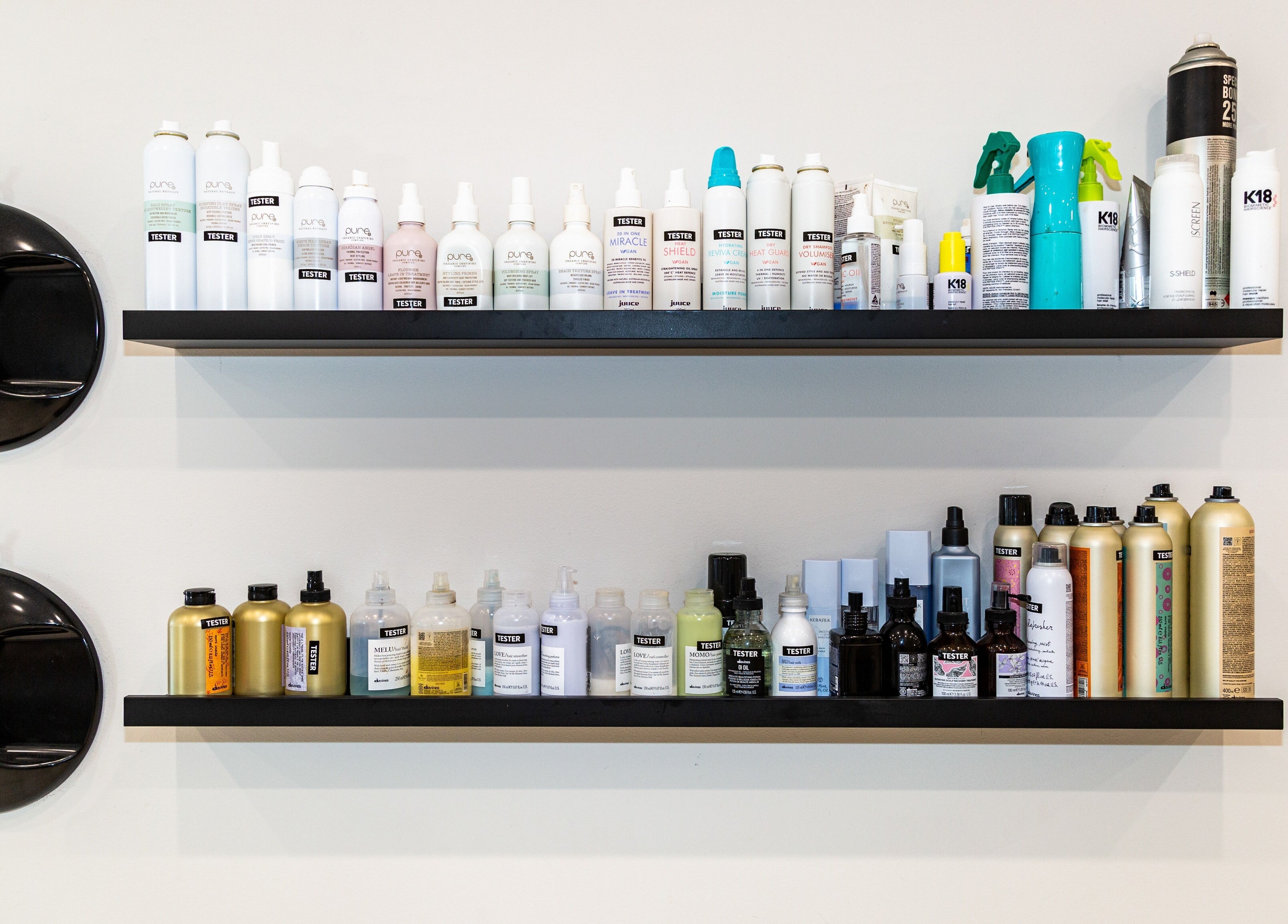Stylish hair product shelves at The Hair Collective - Aesthetics Co., Helensvale, Queensland, AU.