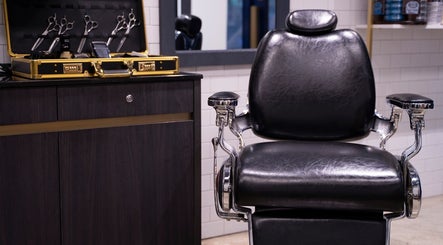 Vintage barber chair at Dudes Barbershop, Sheung Wan, Hong Kong Island, HK offering classic grooming.