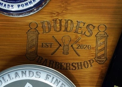 Dudes Barbershop logo engraved on wood, Sheung Wan, Hong Kong Island, HK.