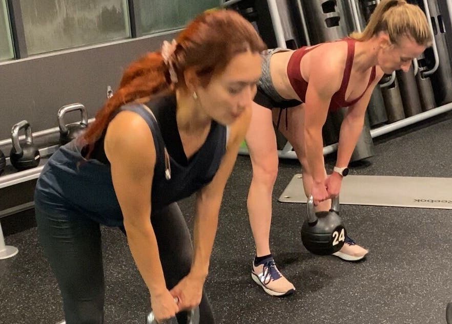 Women exercising with kettlebells at JB FiTNESS PERSONAL TRAINING, London, England, GB.