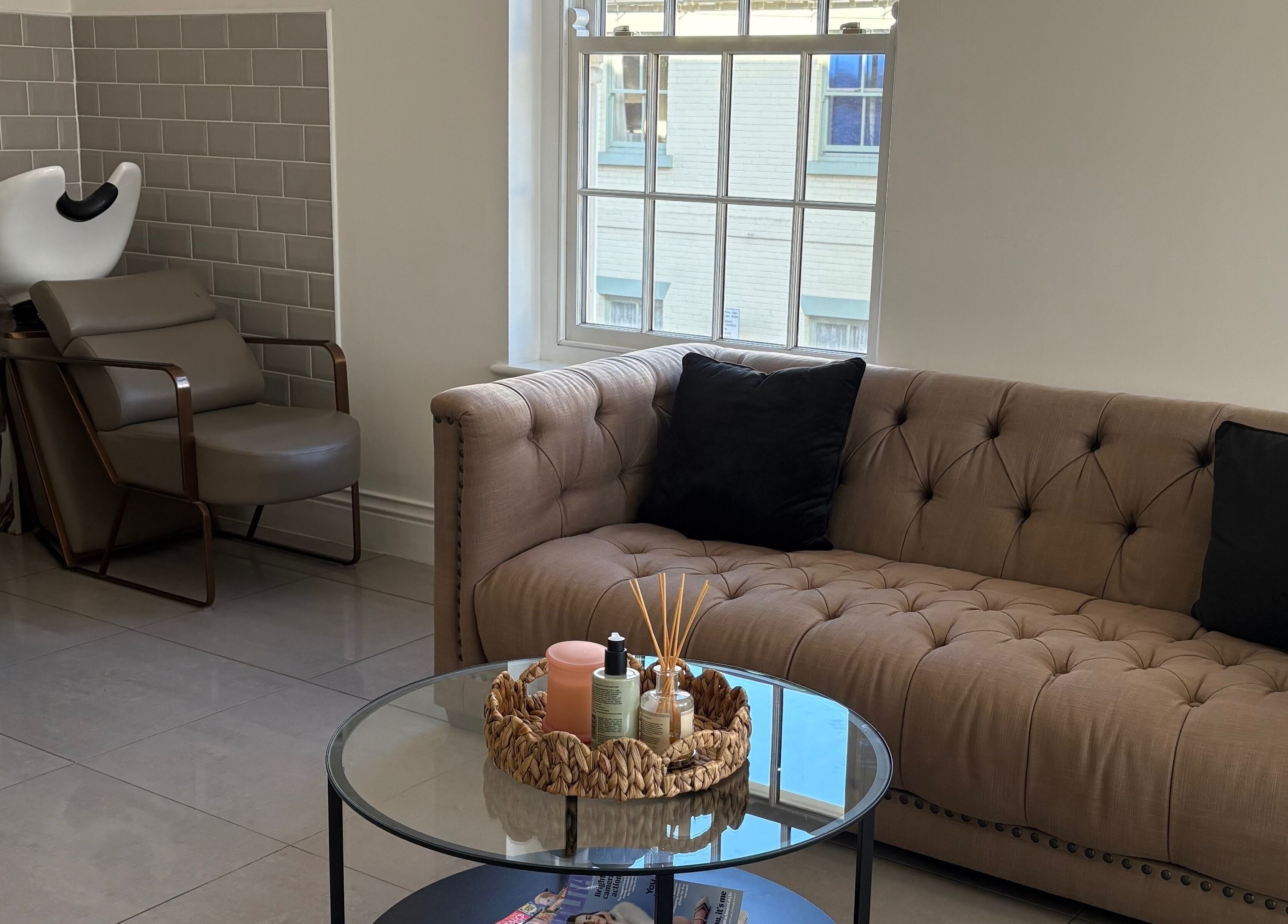 Comfortable waiting area at Hailgate Hair&Beauty, Howden, England, GB with cozy seating and decor.