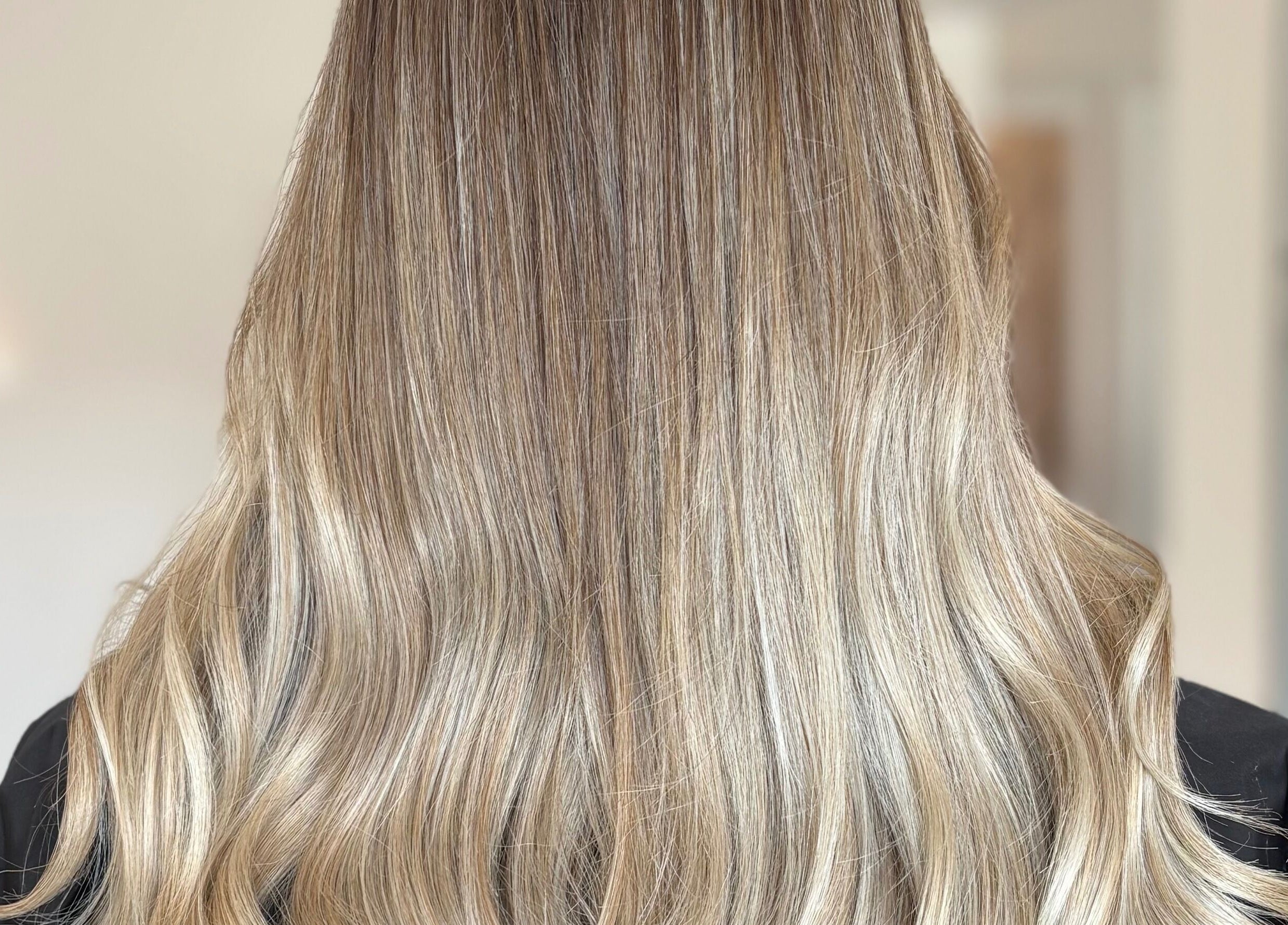 Elegant blonde waves styled at Hailgate Hair&Beauty, Howden, England, GB.